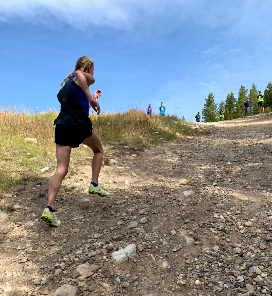 CMC XC Eagles women athlete on course at the CMC XC Open in Leadville
